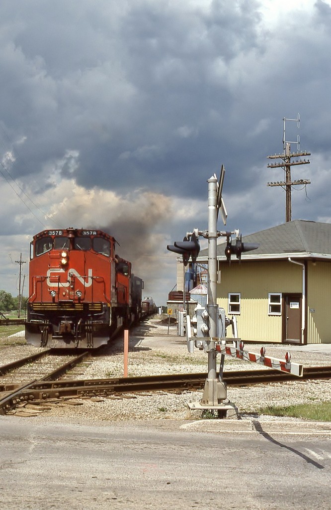 CN Train 561 starts to pull out of Hagersville ON on it's way to Nanticoke under a threatening sky. Classic MLW power doing what it does best.