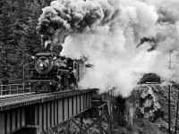 During the weekend of May 27, 28, 29, 2000 Trains Unlimited Tours chartered the BCR "Port Coquitlam" 3716 and 4 cars from BC Rail for a trip from North Vancouver to Kelly Lake, BC. The trip consisted of photo run bys in many of the scenic locations along the Squamish and Lillooet subs. This scene, taken crossing the Cheakamus River Bridge, was one of those examples. 