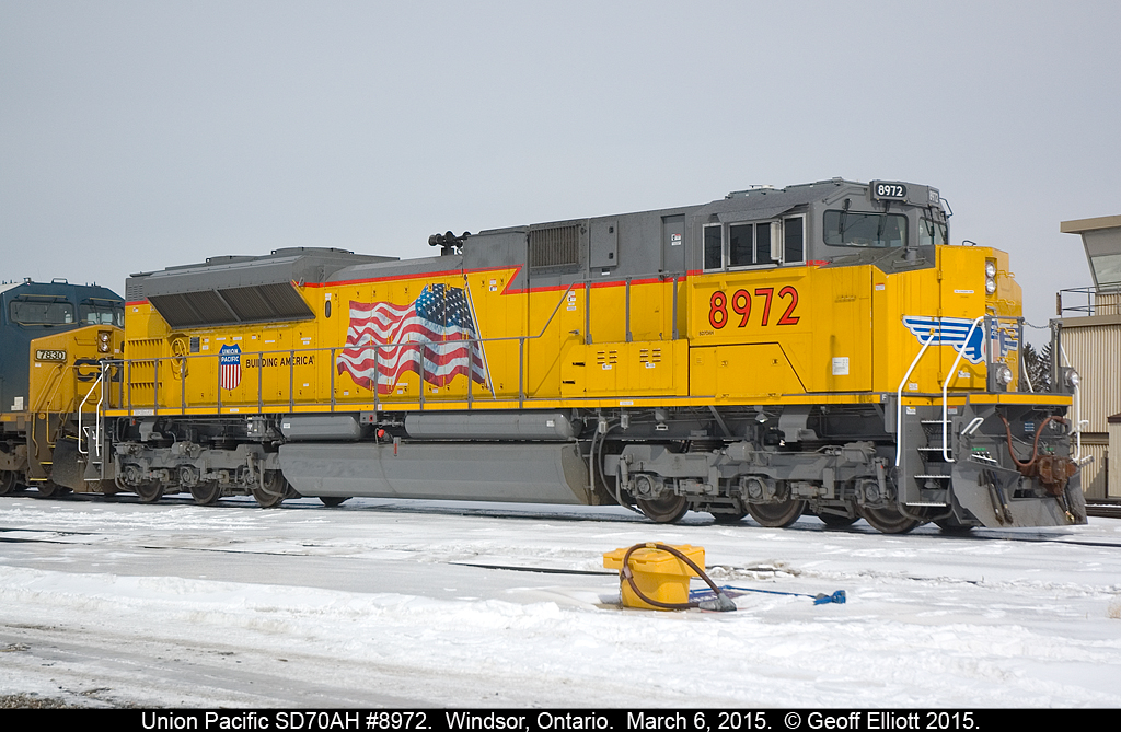 Union Pacific SD70AH #8972 led train 640-021 to Windsor, Ontario on March 6, 2015. Once it arrived they backed the train into the yard to stage it for a later departure. Even though it was a 'dull' day, the unit just shined against the snow.