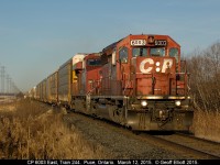 CP SD40-2 #6003, with a rather interesting pair of number boards, crosses Puce Creek in Puce, Ontario on the morning of March 12, 2015 with a rather big train in tow.