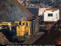 Zalev Brothers 44Tonner pulls an empty scrap gon past the 'yard office' to set over to another track in their Windsor scrap yard on March 12, 2015.