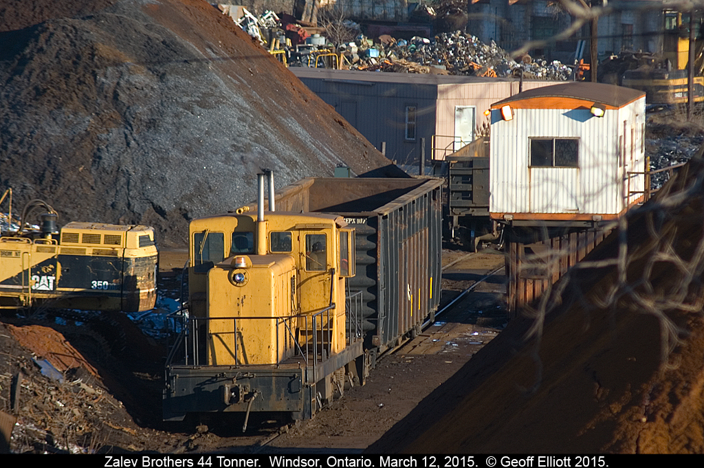 Zalev Brothers 44Tonner pulls an empty scrap gon past the 'yard office' to set over to another track in their Windsor scrap yard on March 12, 2015.