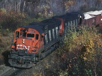 CN C-630 2005 is leading gypsum loads from the quarry at Milford to Wrights Cove.