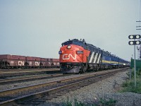CN FP9A 6532 leads #11, the Scotian, past the station at Rockingham, six miles into its trip from Ocean Terminal in Halifax to Montreal's Central Station.