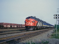 CN FP9A 6532 leads #11, the Scotian, past the station at Rockingham, six miles into its trip from Ocean Terminal in Halifax to Montreal's Central Station. 