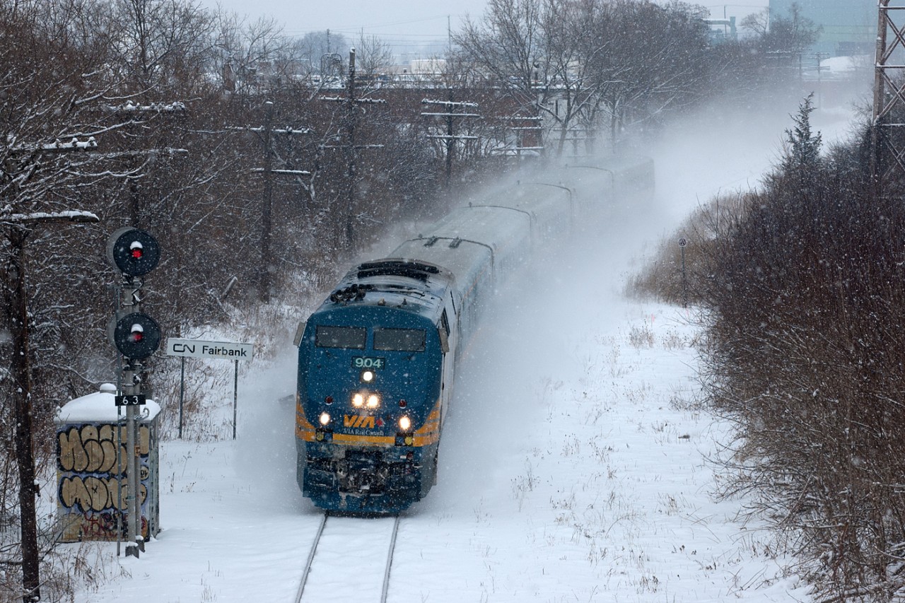 With the Georgetown South Project coming to completion on the Weston Sub, there won't be many more occasions when VIA is forced to detour over the Newmarket Sub. Here's one of the last detours - VIA 84 at Fairbank, heading to Union in a snow squall.
