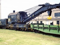 [Editors note: long gone, view from C&O Backshops at St. Thomas - all that is left of this is a pit] After viewing Mr. Mooney's photo I did a little searching & found this auxiliary hook at the same location. It appears to be steam powered. I never saw it in operation. Was always on standby. If my memory serves me correctly it went to London for scrap. Any updates or corrections?