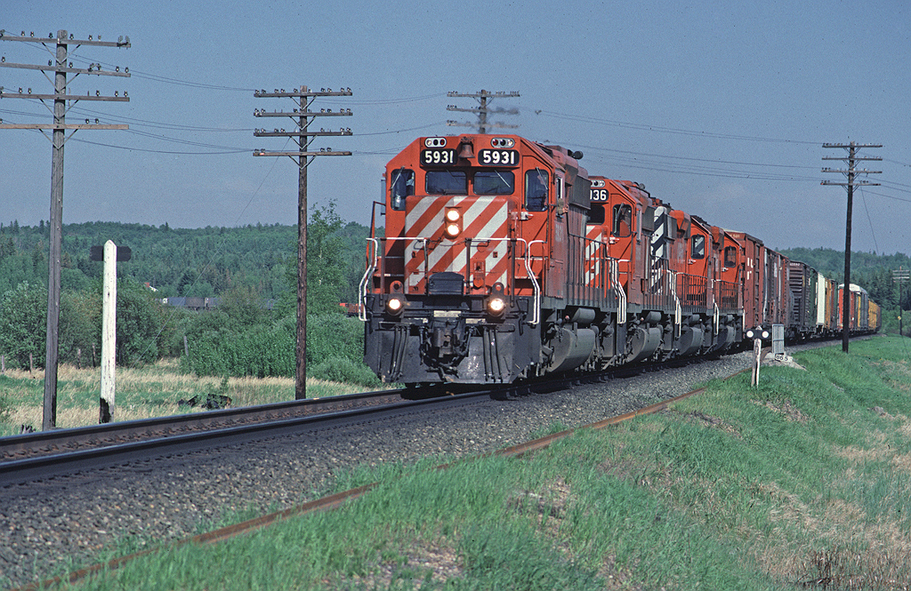 CP SD40-2 5931 leads a detour running on CN from Edmonton - Kamloops due to a derailment on the CPR main line to the south.