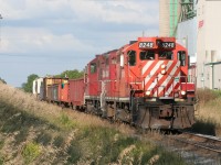 Two CP GP9s lead a short westbound at Ayr on an August 2011 evening. 