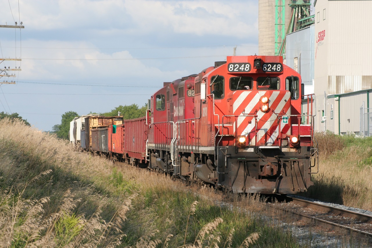 Two CP GP9s lead a short westbound at Ayr on an August 2011 evening.