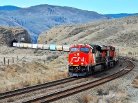 This mixed freight is passing through the tunnel at Kissick behind CN nos.2909 & 2220 and is headed eastwards towards Kamloops.