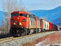Different power in the Okanagan today. CN nos.2405 & 5545 are climbing out of Armstrong with a southbound freight.