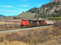 This southbound mixed freight is crossing the Grandview Flats area of Spallumcheen behind CN nos.2520 & 2570. Power in the Okanagan these days seems to be exclusively supplied by six axle locomotives.