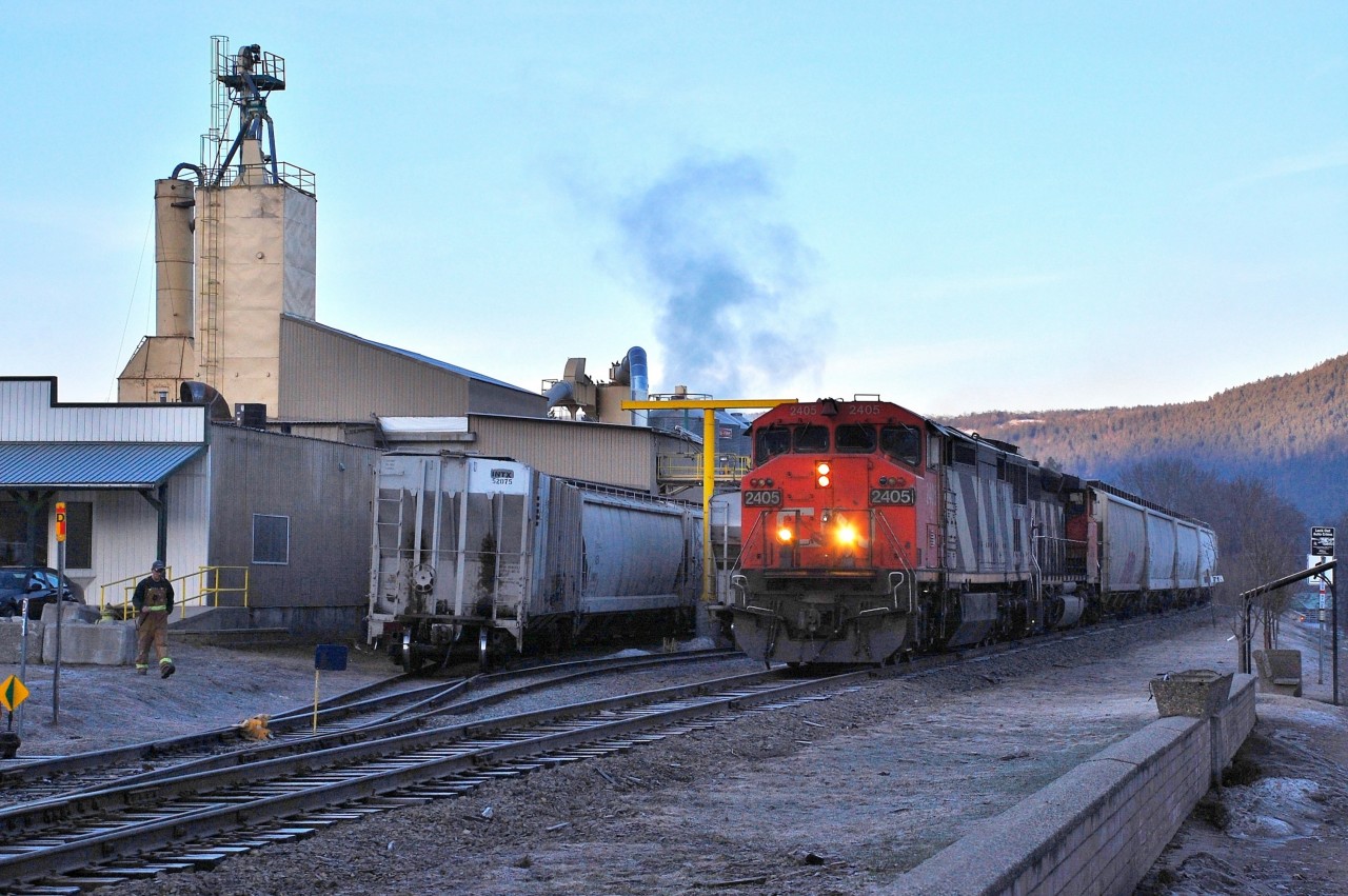 It's early morning in downtown Armstrong as CN 2405 has arrived to lift some cars from the pellet plant.