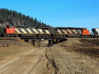 CN nos.2405 & 5348 are climbing out of Armstrong with the morning northbound freight and crossing the recently rebuilt bridge over Betts Rd.