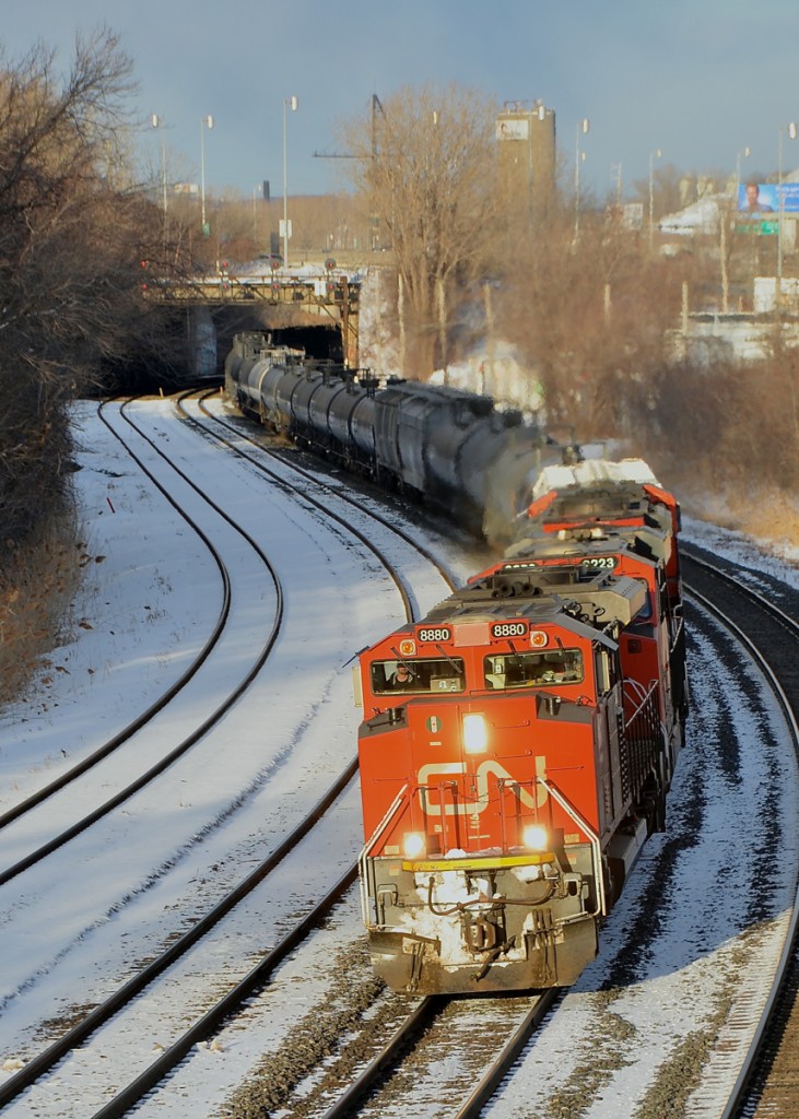 The sun came out at just the right time for me, allowing the evening sun to illuminate CN 323 passing through Montreal West with three units (CN 8880, CN 2223 & CN 8006).