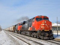 A later than usual CN 372 passes through Dorval with CN 2320 and CN 5689 at the head end and CN 8935 as the DPU during a brief sunny spell.