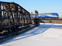 AMT 1350 pushes a deadhead movement towards Montreal's Central Station during the evening rush hour.