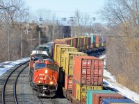 CN X372 with CN 2249 in the lead passed CN 149 at right.