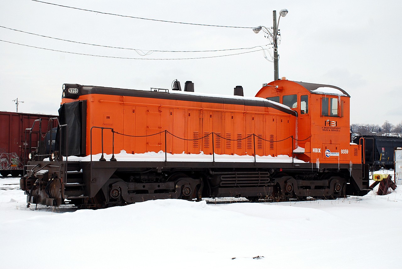 HBIX 9359, leased for years to Oxy Vinyls in Thorold/Port Robinson, is now homeless after being replaced by a SW1000 leased from LTEX. 9359 is presently stored in Southern Ontario Railway's Stuart Street yard in Hamilton, ON. The SW1200 was built for the Pennsylvania Railroad.