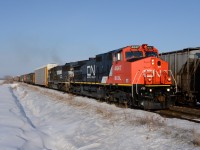 BCOL 4647 with NS 6664 lead train 384 east out of Sarnia meeting west bound train 301 at Waterworks Sideroad.