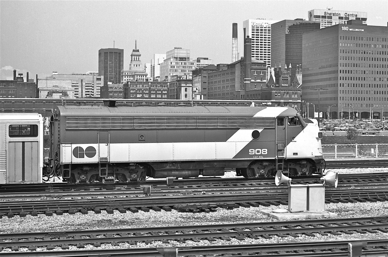 FP7A #908 is shown approaching Toronto's Union Station, circa 1976.  This GMDD locomotive was built in July 1953, and originally served on the Ontario Northland Railway.  Acquired / rebuilt by GO Transit in 1973, she served until 1995 when she was retired and scrapped.