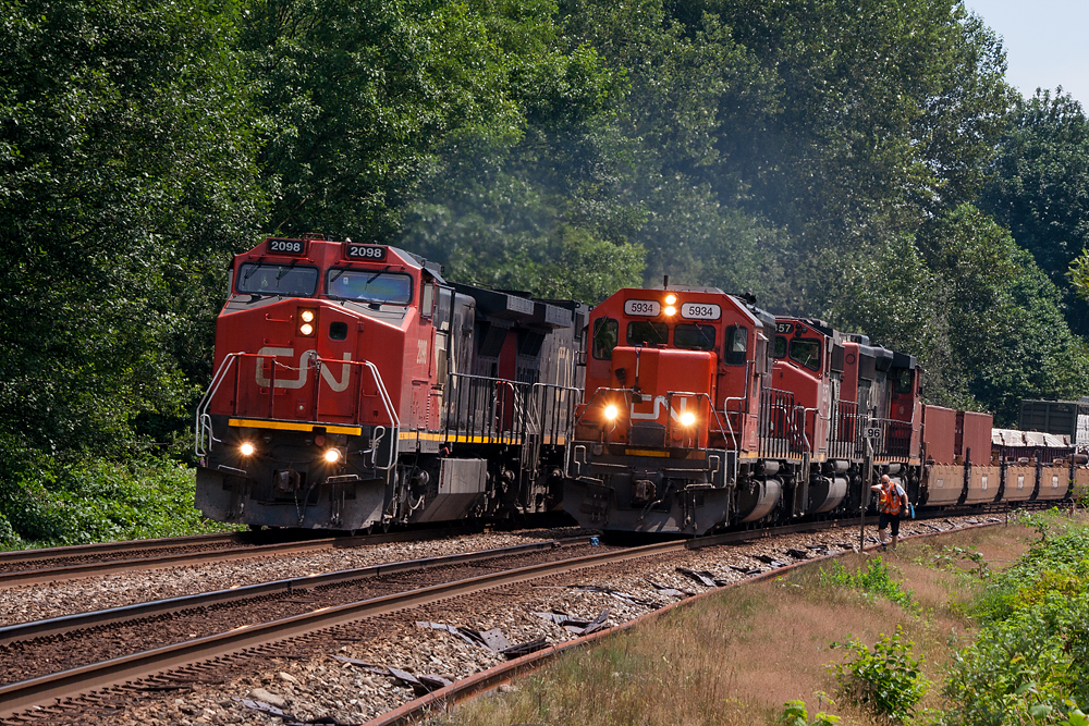 Westbound meets at Glen Valley sees CN train 417 (Edmonton-Thornton Yard) and CN 503 (CN VIT Yard-Roberts Bank) at Glen Valley. 503 is made up of well cars only and are taking them to the Bank for container loading. It was also neat to catch two older Rent-A-Wrecks from a previous life. CN 2098 is an ex-Santa Fe C40-8W and 5934 an ex-GTW unit.