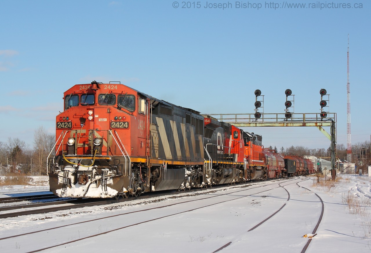 CN 331 is seen arriving at Paris Junction with CN 2424, CN 2164 and BLE 902.  902 was on its way to Metro East Industries for mechanical repairs.  I figured a bright sunny winter shot being posted on a gloomy day would be nice!  Also a good way to kill free time after having classes cancelled.