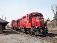 CP 3017,3045 and 2307 reverse onto the Grand River bridge before taking the cars from the passing track onto the Kitchener sub.