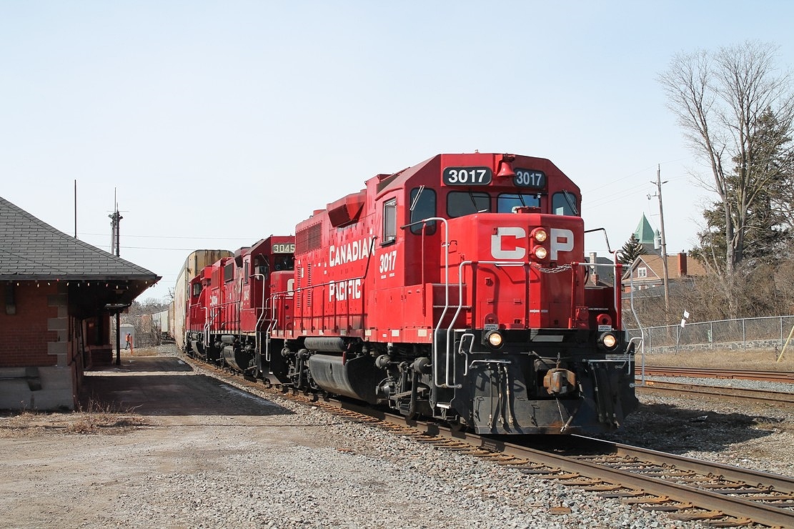 CP 3017,3045 and 2307 reverse onto the Grand River bridge before taking the cars from the passing track onto the Kitchener sub.