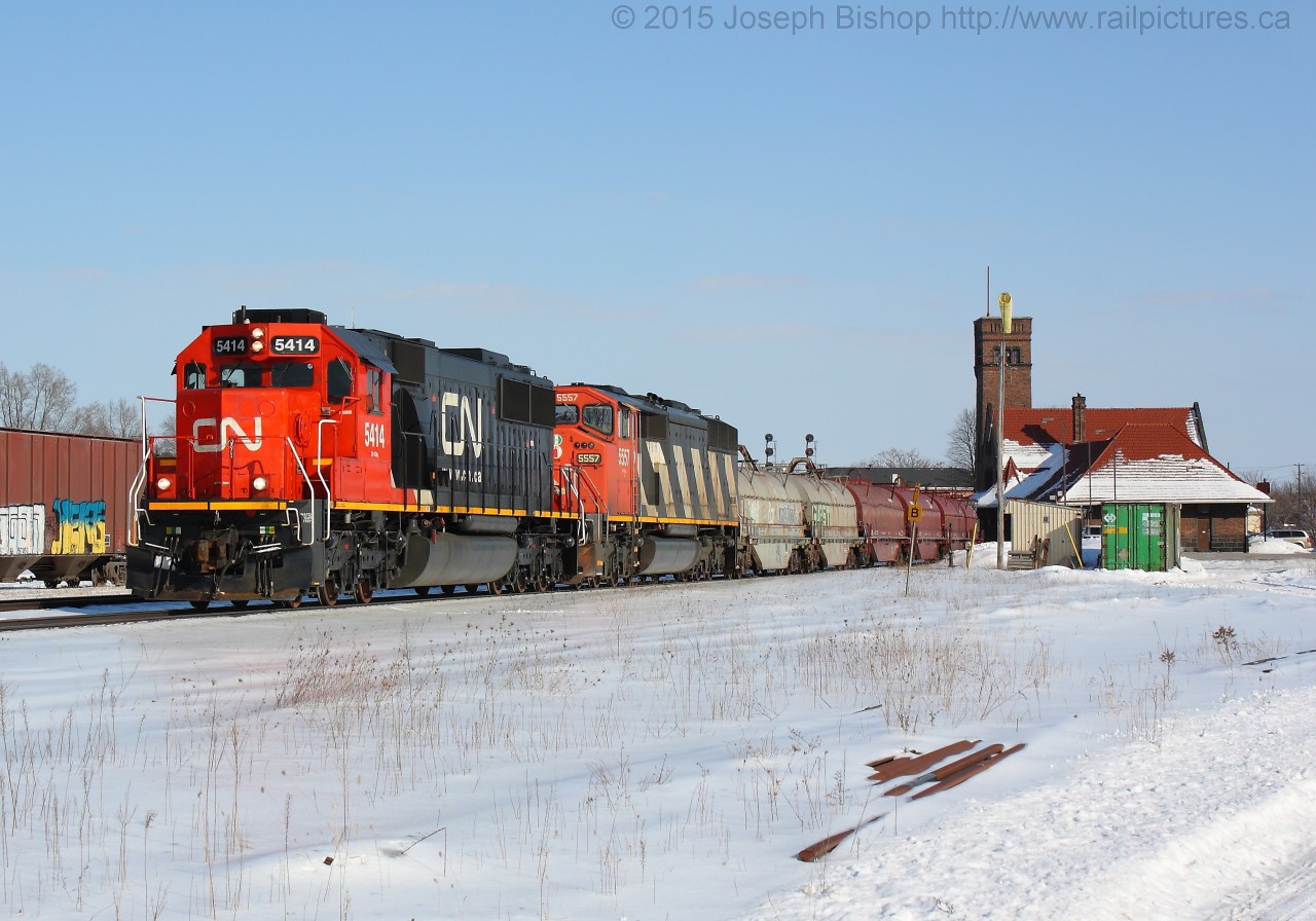 CN 331 makes a mid afternoon appearance in Brantford with CN 5414 and CN 5557 providing the power for a surprisingly lengthy train.