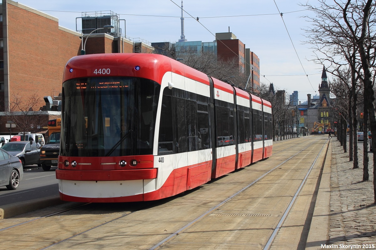 Class leading TTC 4400, one of the newly acquired streetcars, runs on Spadina Ave by the campus of the University of Toronto. Now, time to photograph some of the older streetcar models before they go 'extinct' at the snap of a finger.