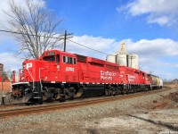 Canadian Pacific's 'Streetsville Turn' or train T-14, a Monday To Friday West Toronto to Streetsville and back local has just finished switching at the Mondelez plant and is now flooring it on the main to Streetsville Yard, only about 2 miles down the tracks. This days T-14 had 2 freshly rebuilt ECO units in the lead. ECO units are rebuilt from older GP9U locomotives. 