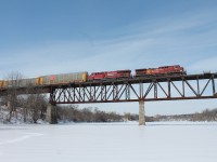 CP 9624 leads CP 8872 over the Grand River Bridge on a cool,windy winter day.
Taken from the middle of the frozen Grand River after a 2 hour wait.
Cambridge Rowing club in background. 