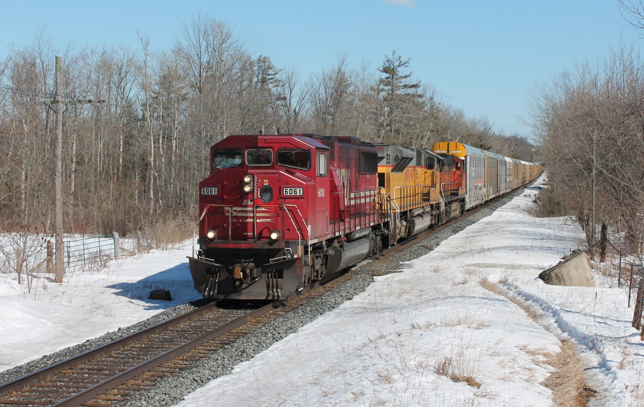 SOO 6061 leads UP 3747 and BNSF 4672 through Puslinch past MM43 on a fine sunny March afternoon.
Another CP run with no sign of CP power.