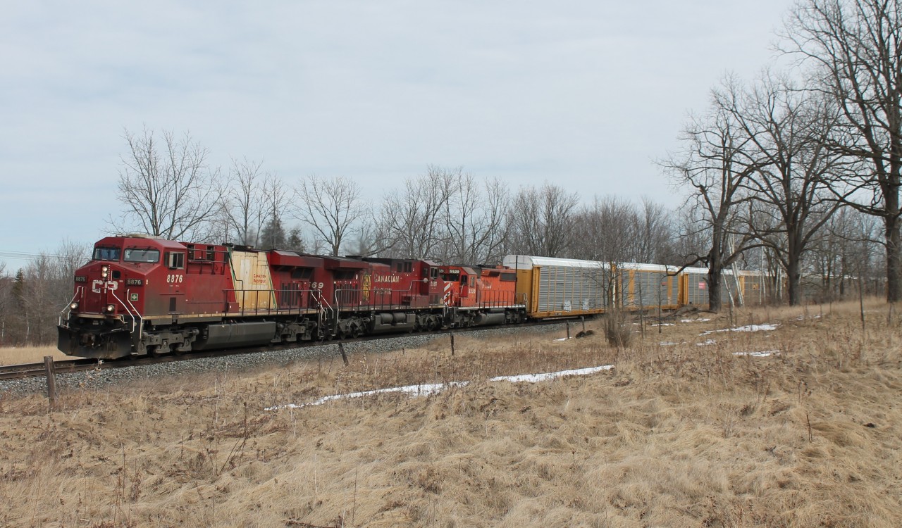 CP 8876 in its faded Olympic paint job leads CP 8569 and CP 5920 into Puslinch with a load of auto racks