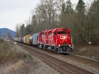 Looking all new and shiny, CP Cab Control 1126 leads CPs Sumas Turn (Port Coquitlam - Sumas Border) through Silverdale, BC, west of Mission. 1126 is a former GP35 and was sent back east to Montreal last Summer for rebuild.
