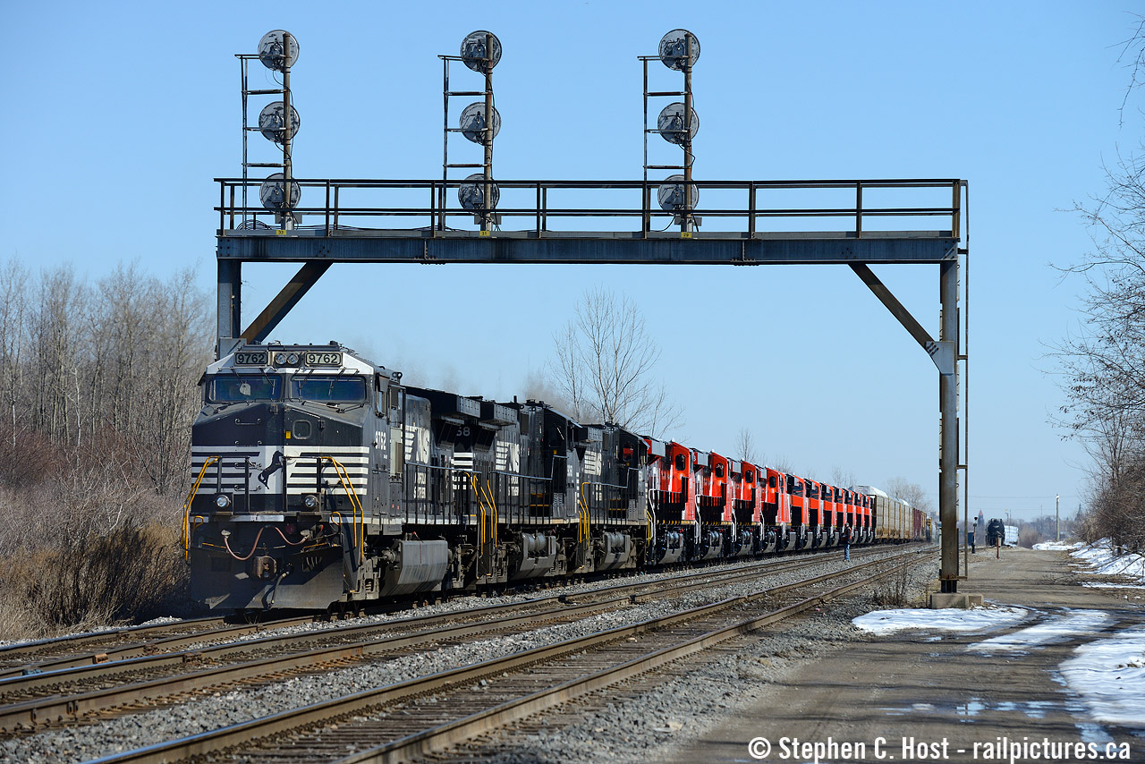 NS H53, with its compliment of Canadian crew from the Norfolk Southern St. Thomas (Ontario) division, bring an express delivery of 12 brand new CN GE's (See reporting marks for a complete list). Interestingly enough, all but one of these brand new engines are permitted to operate into the US owing to Tier 3/4 restrictions that came into effect in 2015, and predictably, one one of these engines was actually idling (CN 2961) the rest were offline. These engines are likely to make the trip to Toronto on CN 422 on or after Monday the 30th of 2015 - consider this a heads up for anyone out and about.