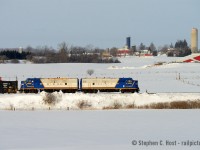 The first time I would see this pair working together was on a GEXR plow extra - which I was wholly unprepared to chase, back on February 7 2007. I don't know what possessed me to do it - the weather was atrocious, but I managed some interesting photos despite the lighting and my trusty 'ol white Tercel. I posted many of these photos here on rp.ca a few years back: <a href=http://www.railpictures.ca/?attachment_id=6604 target=_blank> click here </a> <a href=http://www.railpictures.ca/?attachment_id=6605 target=_blank> and here </a> <a href=http://www.railpictures.ca/?attachment_id=6719 target=_blank> and here </a><br><br>
Plows were infrequent back then (Except that week - both GEXR plows were in service - two on a single day were possible on the same railway!) and other priorities got the best of me in the coming years, but by 2009 - 1400 and 1401 were in a deadline, pilfered of parts and looking like they were about to be scrapped. Enter OSR. We know the story from here - but when I heard that these two would be plowing together, again, I had to make time for this. <br><br>
Pictured above, two very clean engines and a pristine plow, fresh from the warm bosom of the Salford Shops and not a lick of snow on the equipment - yet. Next stop - McDonalds in Tillsonburg.