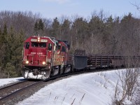 SOO6035-5765 lead a loaded CWR train through Carley.