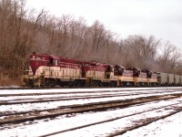 TH&B Rock Trains were fairly common for a short while. This view of the train bound for Port Maitland is from Kinnear Yard in Hamilton; when was the last time it was THIS empty?? Typical dull winter's day; TH&B 72, 73, 57, 51 and 55 in a scene that has been gone for many years. The TH&B ceased to exist @ 1987.