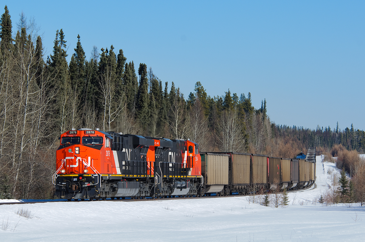 112 coal empties for Coal Valley negotiate the rollercoaster Foothills Sub. New CN ES44ACs 2876, 2914 and 2899 (rear DPU) provide the power.
