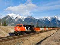 Making its maiden trip west, brand new CN ES44AC 2949 guides Q111's train onto the north track at Henry House.