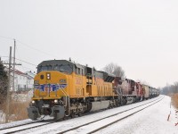 CP 551 with a nice UP SD9043MAC leader (UP 3623) is westbound on the Adirondack sub on the south shore of Montreal. Trailing are CP 9804 and CP 3124.