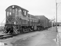 CPR 6539 works along Queens Quay in Toronto Harbour, still painted in faded maroon and grey paint with block lettering.  Two years later, 6539 was sold to Kimberly-Clark to work at their mill in Terrace Bay, and today it is on display in Schreiber.  http://www.railpictures.ca/?attachment_id=5615