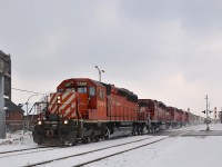 An empty grain train from Quebec City with three CP SD40-2's and an ex-SOO SD60 (CP 5949, CP 5743, CP 5773 & CP 6252) are nearly at the end of their run as they approach St-Luc yard in Montreal. While the train has CP power and is on CP trackage here, it is a Quebec-Gatineau train and crew.