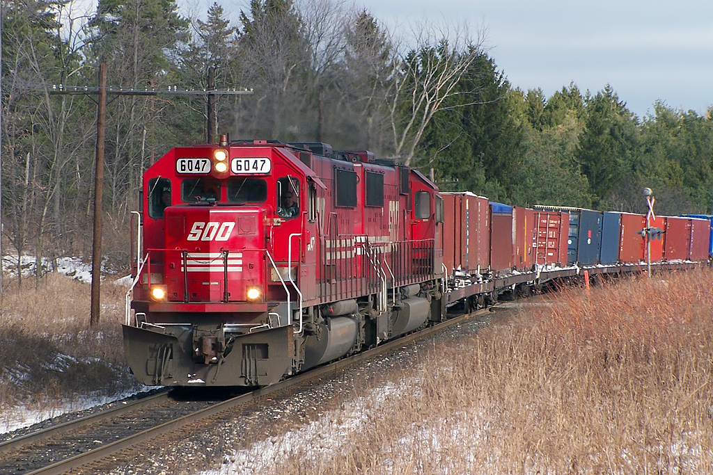 2 red's with containers.