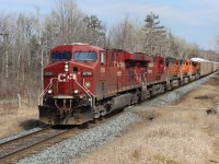  CP 8799 leads CP8780, BNSF5527,BNSF5363,BNSF9097 and BNSF6881 past MM43 on its daily run through Puslinch with auto racks. Clouds parted just in time for a sunny shot. 