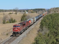 Still sporting stripes on her pilot, the former star of the movie "Unstoppable" leads a relatively short train 118 under Hwy 9.