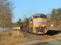 With the day quickly coming to an end and the shadows growing (and ruining several photo locations), a couple of UP engines bring train 420 through Midhurst enroute to Toronto.